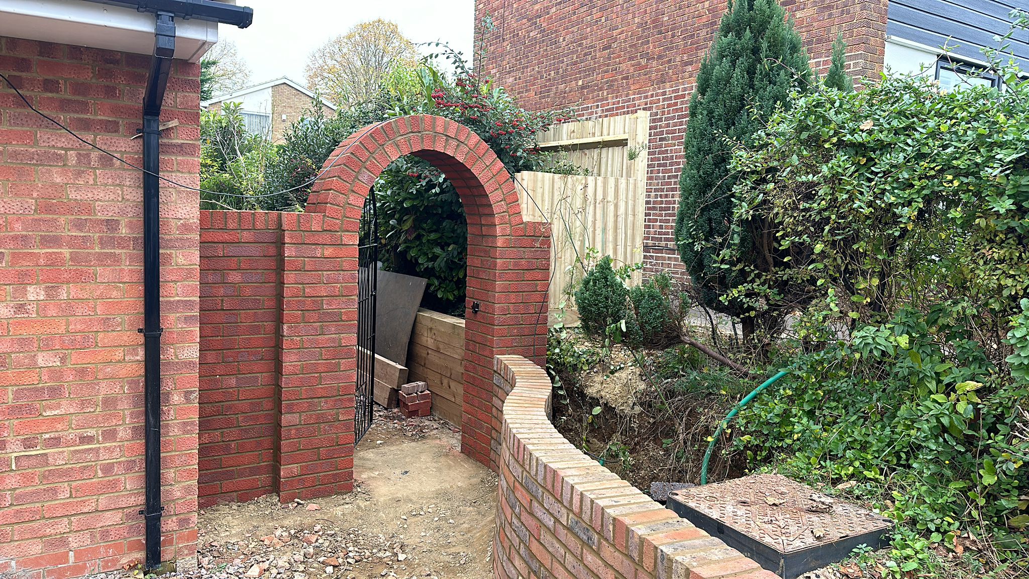 curved wall and arached gate